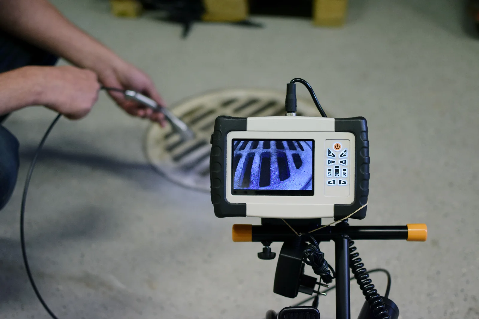 Plumber performing a sewer camera inspection